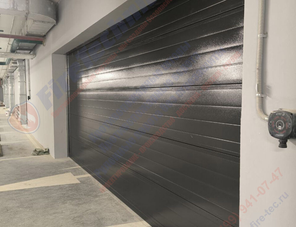Секционные противопожарные ворота FireTechnics-S EI60 в паркинге ЖК